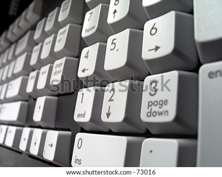 Photograph of a computer keyboard showing the numbers.  Taken with a shallow depth of field from right to left