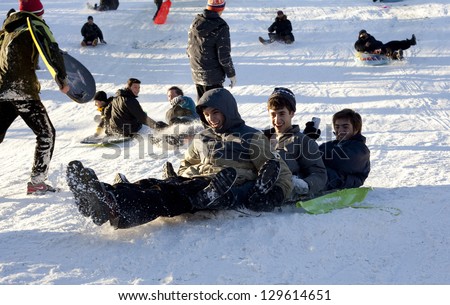 NEW YORK, NEW YORK - FEBRUARY 9:  People enjoy sled riding in Central Park one day after snow storm Nemo. Taken February 9, 2012 in NYC.