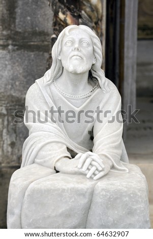 Cemetery statue depicting Jesus as he suffered in the garden of Gethsemane at the foot of the mount of olives.