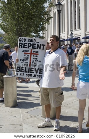 BRONX, NEW YORK - AUGUST 10: An outdoor preacher warns that Jesus is the way to salvation.  August 10, 2010 in , Bronx, NY.