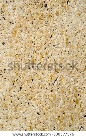 Colorful relief cladding stone slabs on wall closeup