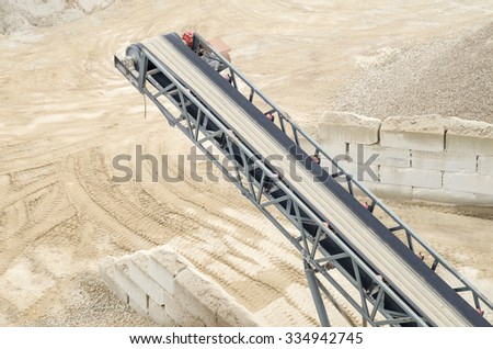 Belt conveyor in Gravel Quarry in cloudy day