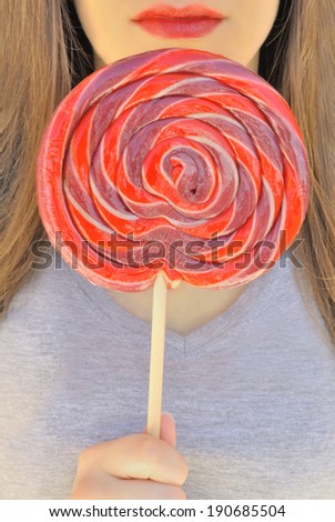 Red lips and lollipop