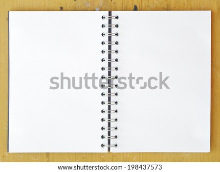 notebook spiral on wooden board