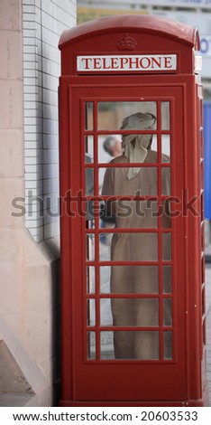 Arab in a phonebox in Dubai.
