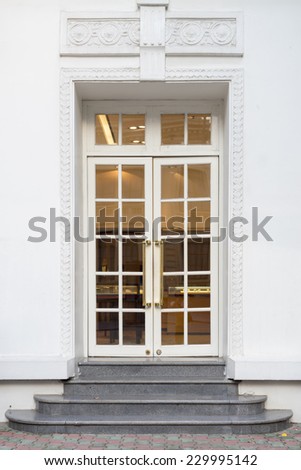 Vintage style doors in front of building