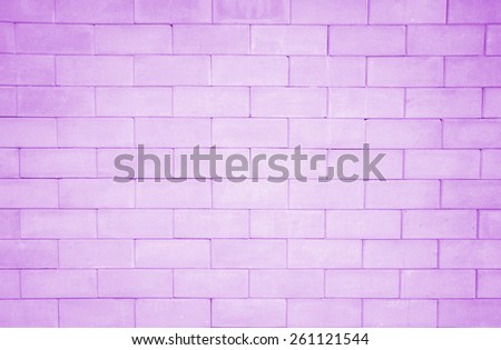 The purple brick background