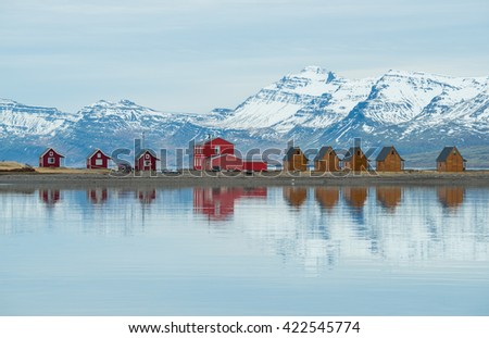 The reflection of the small cottage in east Iceland.