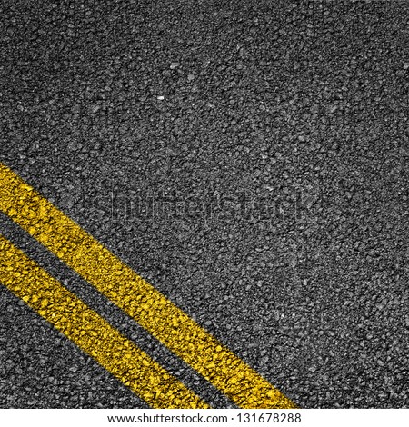 Highway surface with two yellow lines. Asphalt backdrop