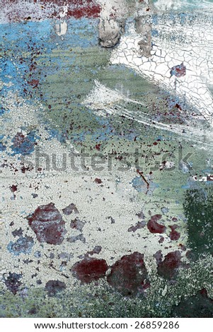 Abstract painted surface of an old metal garage