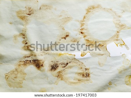 Lot of circle shape coffee stains on white background.