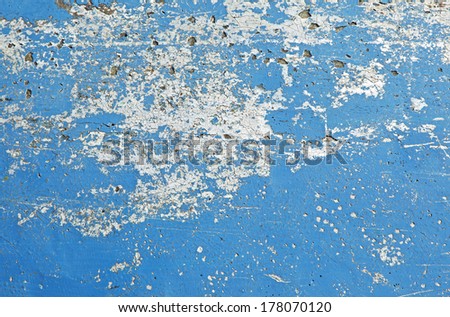 High quality textured and abstract weathered natural faded blue pattern paint pattern with aged and grunge look which can be used as a wallpaper or background