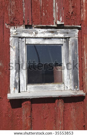 Window on old wood house in bad condition