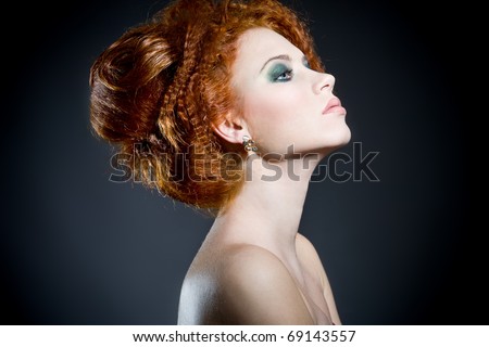 stock photo Beautiful redhead woman's profile Perfect classy hair style 