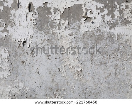Concrete gray wall and the old paint is peeling off the wall