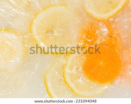 Helpful sweet delicious fresh fruit ice cream with slices of lemon and orange