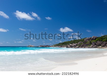 Beautiful beach Anse Lazio with white clean sand on the island of Praslin Seychelles and the huge granite stones