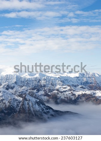 Kitssteynhorn glacier in the Alps - December 6, 2014 - View of the Alps in Kaprun and clouds below - Zell am See 6 December 2014, Kaprun, Austria