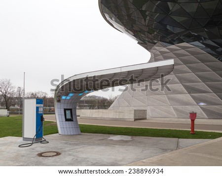 Munich - 3 December 2014: New gas station for electric cars in the style of hi-tech museum near the BMW 3 December 2014, Munich, Germany