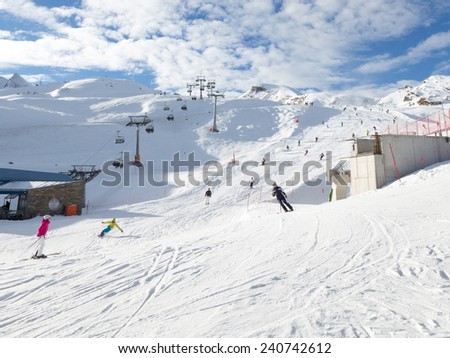 Zell am Cee - December 6, 2014: People come from snow slope skiing and snowboarding at an altitude of 3000 m on the glacier Kitssteynhorn December 6, 2014, Zell am Cee, Kaprun, Austri