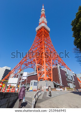 Tokyo - January 28, 2014: At the foot of Tokyo\'s red television tower January 28, 2014, Tokyo, Japan
