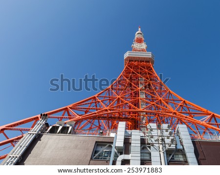 High Tokyo Tower on the background of blue sky in Tokyo, Japan