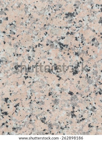 light speckled granite stone with small patches of gray and pink in the slab