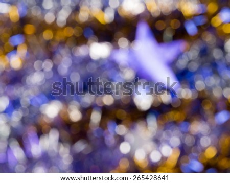 horizontal violet blur abstraction with gold glitter and star