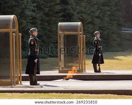 Moscow - April 12, 2015: An honor guard at the Eternal Flame at the Tomb of the Unknown Soldier in Alexander Garden in memory of those killed in the Great Patriotic War, April 12, 2015, Moscow, Russia