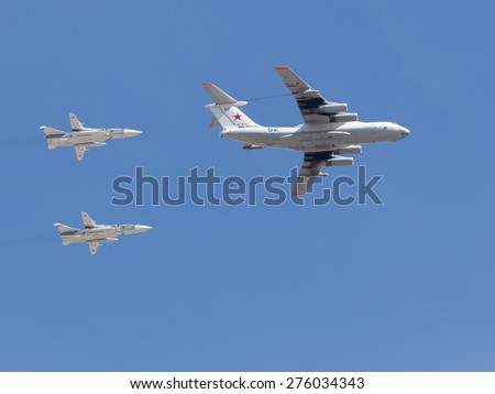 Moscow - May 7th, 2015: Powerful military planes imitate steam aerial refueling over Red Square May 7, 2015, Moscow, Russia