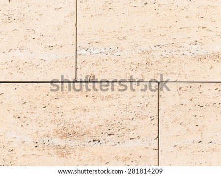 beautiful light beige natural travertine dark depressions and dents in the bars