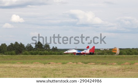 Moscow Region - June 17, 2015: Beautiful military aircraft MiG-29 Swifts aerobatic team performs a landingin the international military-technical forum ARMY-2015 June 17, 2015, Moscow Region, Russia