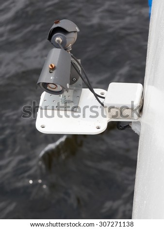 cameras mounted on board the ship to keep order on the background of gray water