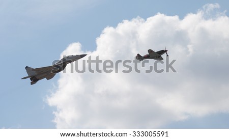 The Moscow region - August 28 2015: the MiG 35 and MiG 3 fly in a demonstration flight at an air show Max 2015 August 28, 2015, Zhukovsky, Moscow Region, Russia