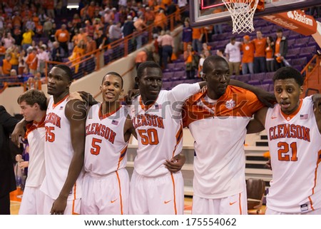 Clemson, SC - January 11, 2014 Clemson players pause to celebrate with the fan after the upset victory of Duke