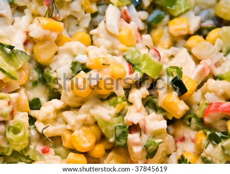 Salad from crab sticks with corn onion mayonnaise olive