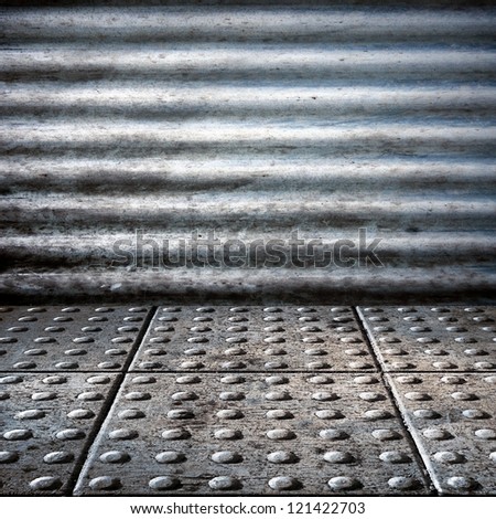 stripped metal texture  of  garage wall and rivets on floor ,  abstract background