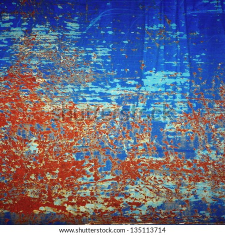 blue chipped paint on rusty metal surface / abstract grunge background