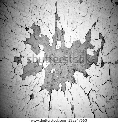 chipped paint hole on shabby wall ; abstract grunge background