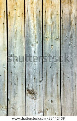 weathered wooden background, peeling paint, nailed boarded fence,