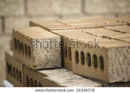 close up of a pile of  bricks /  construction material warehouse