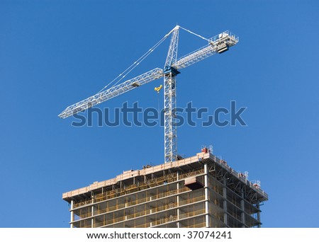 crane on top of building , construction site
