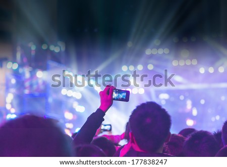 Audience Silhouettes At A Live Music Concert