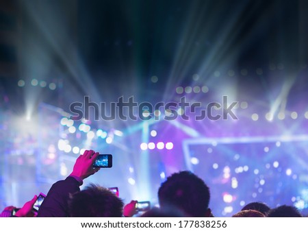 Audience Silhouettes At A Live Music Concert