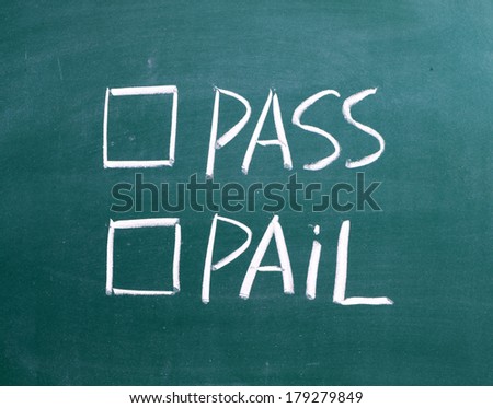 Tick boxes for Pass or Fail on a wiped blackboard