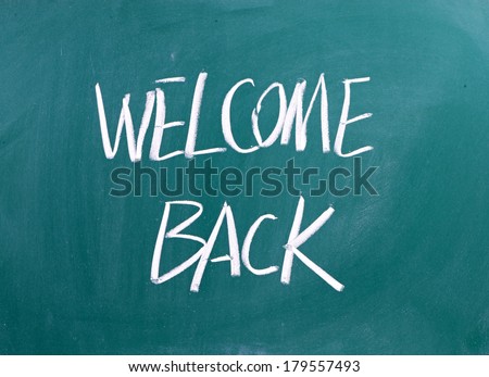 Welcome Back written on a blackboard as a concept for hospitality or Customer Focus in business