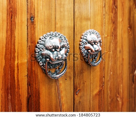 Ancient Chinese door knocker, located in Temple of Confucius