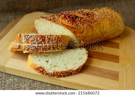 Fresh homemade bread topped with sesame seeds