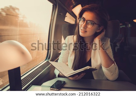 reading a book on the train