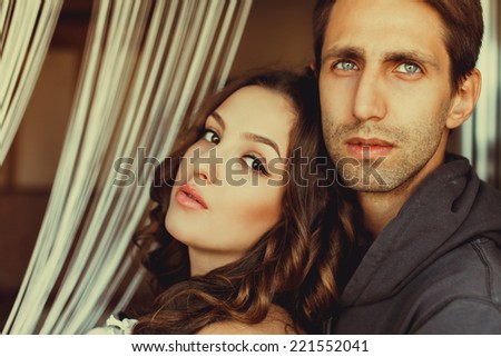 beautiful couple posing in the room